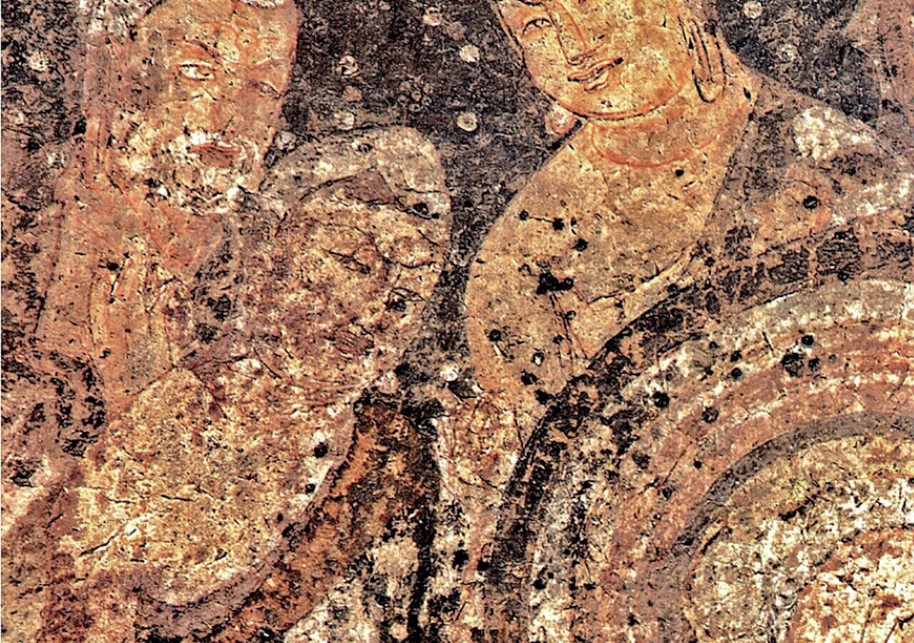 Ancient Indian cave mural detail with painted figures