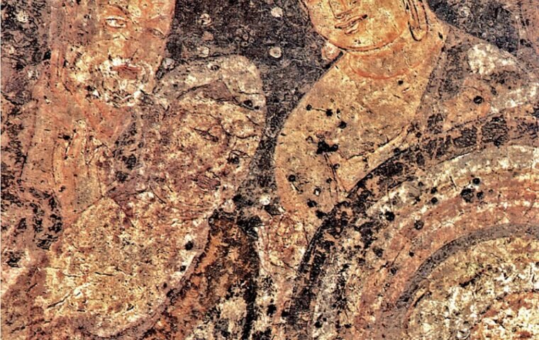 Ancient Indian cave mural detail with painted figures